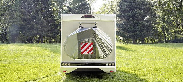 wohnmobil, reisemobil, hintere t-rampe, reifenabdeckung, ausklappbare motorhaube