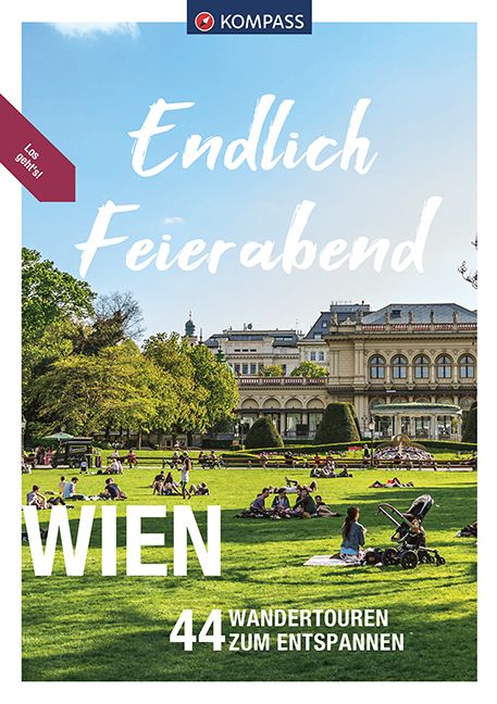 9783991213673 KOMPASS Endlich Feierabend - Wien, Wiese mit liegenden Menschen und Gebäude im Hintergrund, dabei blauer Himmel