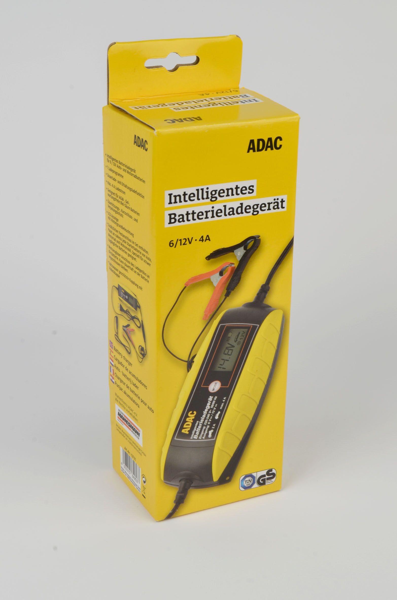 ADAC Mannesmann Batterie Ladegerät schwarz und gelb in gelber Verpackung
