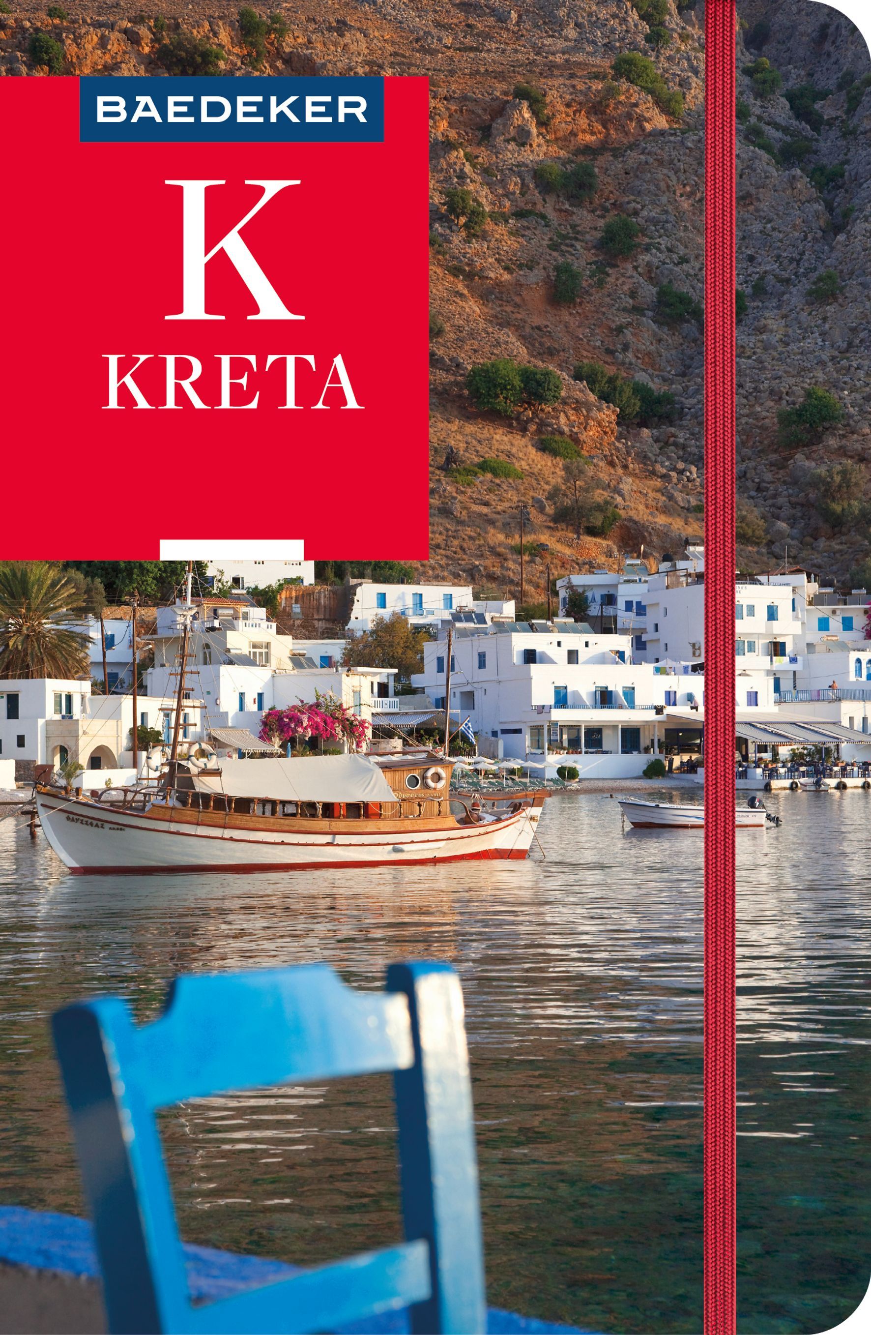 9783575000729 Baedeker Reiseführer Kreta, Cover Blick vom Wasser auf Dorf mit weißen Häusern und Boot davor